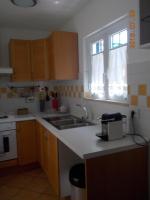 A kitchen or kitchenette at L'attico di Val.