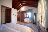 Postel nebo postele na pokoji v ubytování Secret Paradise Beach Villa