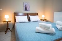 Posteľ alebo postele v izbe v ubytovaní BETTY'S AIR+PORT SEA APARTMENT