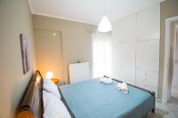 Posteľ alebo postele v izbe v ubytovaní BETTY'S AIR+PORT SEA APARTMENT