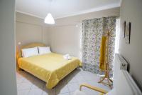 Posteľ alebo postele v izbe v ubytovaní BETTY'S AIR+PORT SEA APARTMENT