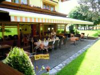 Reštaurácia alebo iné gastronomické zariadenie v ubytovaní Landgasthof Reitsamerhof