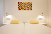 Posteľ alebo postele v izbe v ubytovaní Apartamentos San Marcial 28