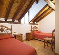 Postel nebo postele na pokoji v ubytování Apartamentos Casa Buisan