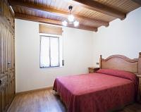 Postel nebo postele na pokoji v ubytování Apartamentos Casa Buisan