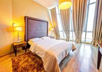 Ein Bett oder Betten in einem Zimmer der Unterkunft Don Prestige Residence