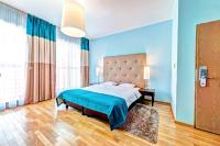 Ein Bett oder Betten in einem Zimmer der Unterkunft Don Prestige Residence