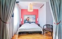 Ein Bett oder Betten in einem Zimmer der Unterkunft Don Prestige Residence