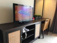 Happy Stay @ Morib Gold Coastにあるテレビまたはエンターテインメントセンター