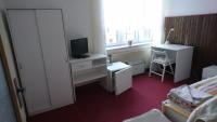 Postel nebo postele na pokoji v ubytování Hotel Šrejber