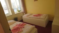 Postel nebo postele na pokoji v ubytování Hotel Šrejber