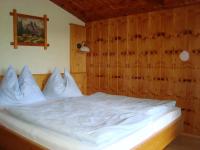 Postel nebo postele na pokoji v ubytování Haus Harmonika