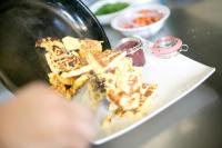 a plate of food on a table with food at Landhotel Berger in Eben im Pongau