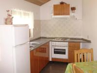 Kuchyňa alebo kuchynka v ubytovaní Apartman KRISTINA and FREE PARKING
