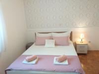 Posteľ alebo postele v izbe v ubytovaní Apartman Jurilj