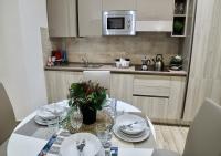 Kuchyňa alebo kuchynka v ubytovaní Central Lepetit apartment De Luxe