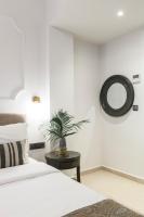 Postel nebo postele na pokoji v ubytování The Mood Luxury Rooms