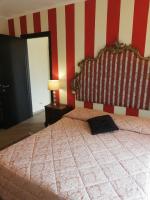 Posteľ alebo postele v izbe v ubytovaní B&B Al Calcandola