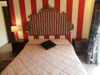Posteľ alebo postele v izbe v ubytovaní B&B Al Calcandola