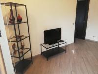 Televízia a/alebo spoločenská miestnosť v ubytovaní B&B Al Calcandola
