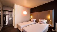 Postel nebo postele na pokoji v ubytování Campanile Hotel & Restaurant Amsterdam Zuid-Oost