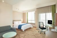 Holiday Inn Express Chengdu West Gate by IHGにあるテレビまたはエンターテインメントセンター