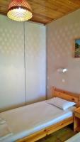 Postel nebo postele na pokoji v ubytování NEFELI House