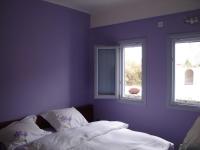 A bed or beds in a room at Thera Incognita Studios