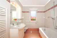 Kúpeľňa v ubytovaní Apartments La Baita