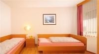 Posteľ alebo postele v izbe v ubytovaní Apartments La Baita