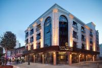 a large building with a sign for a hotel at B LOFT HOTEL in Bursa