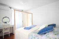 Posteľ alebo postele v izbe v ubytovaní Island stonehouse villa Kala mendula