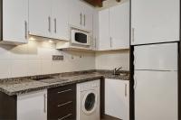 A kitchen or kitchenette at Home4u, Elvira 16, 2A