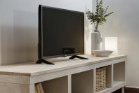 A television and/or entertainment centre at Home4u, Elvira 16, 2A