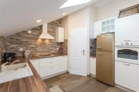 Kuchyň nebo kuchyňský kout v ubytování Apartment Ivana
