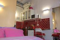 A bed or beds in a room at Gmax Guelfa Apartments