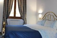A bed or beds in a room at Gmax Guelfa Apartments