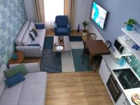A television and/or entertainment centre at Tempo Life Apartman