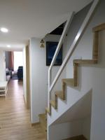 A television and/or entertainment centre at Tempo Life Apartman