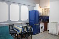 A kitchen or kitchenette at Gmax Guelfa Apartments