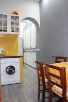 A kitchen or kitchenette at Gmax Guelfa Apartments