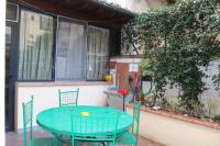 A patio or other outdoor area at Gmax Guelfa Apartments