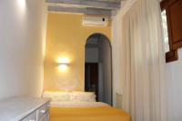 A bed or beds in a room at Gmax Guelfa Apartments