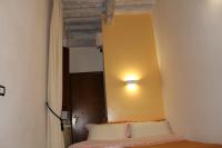 A bed or beds in a room at Gmax Guelfa Apartments