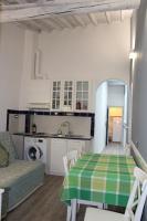 A kitchen or kitchenette at Gmax Guelfa Apartments