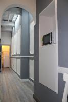 A kitchen or kitchenette at Gmax Guelfa Apartments