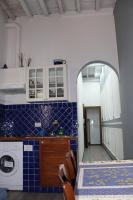 A kitchen or kitchenette at Gmax Guelfa Apartments