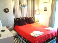 A bed or beds in a room at Greek hospitality 2
