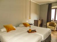 Cama o camas de una habitación en Balneario Aguas de Villaharta