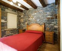 Postel nebo postele na pokoji v ubytování Apartamentos Casa Buisan
